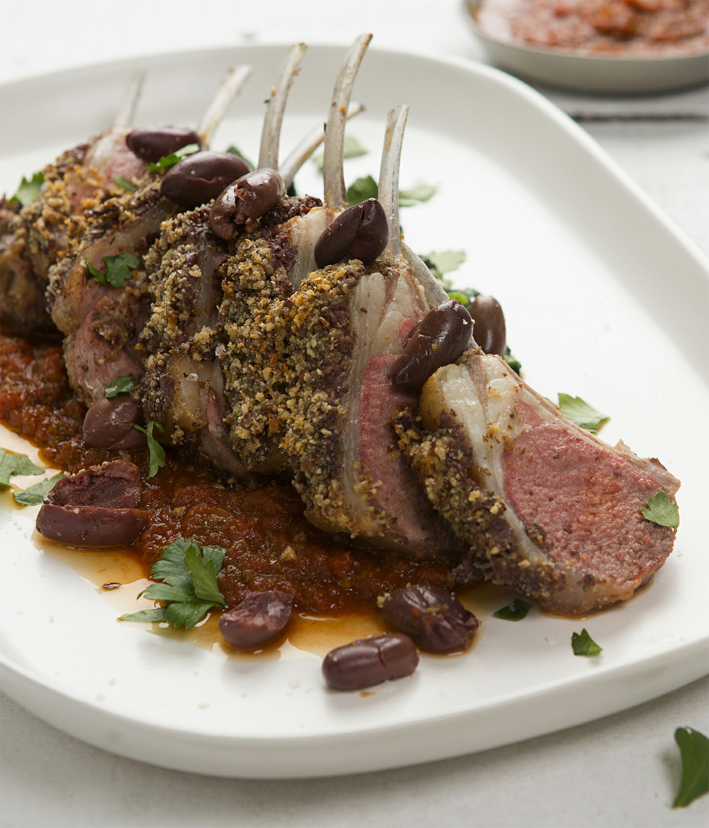 Spring lamb rack with olive crumb on a bed of spinach and tomato sugo recipe