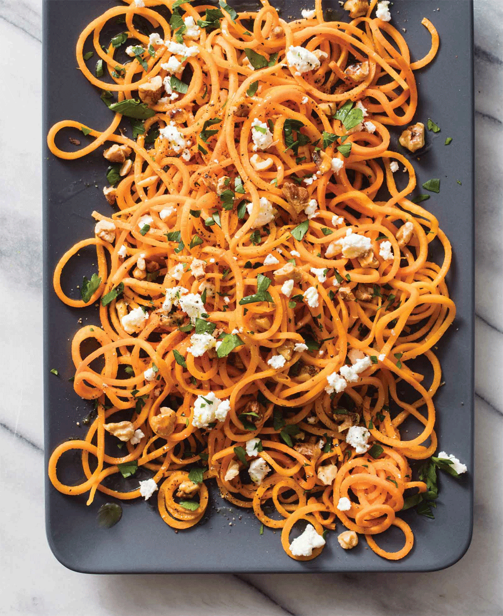 Roasted spiralized sweet potatoes with walnuts and feta recipe