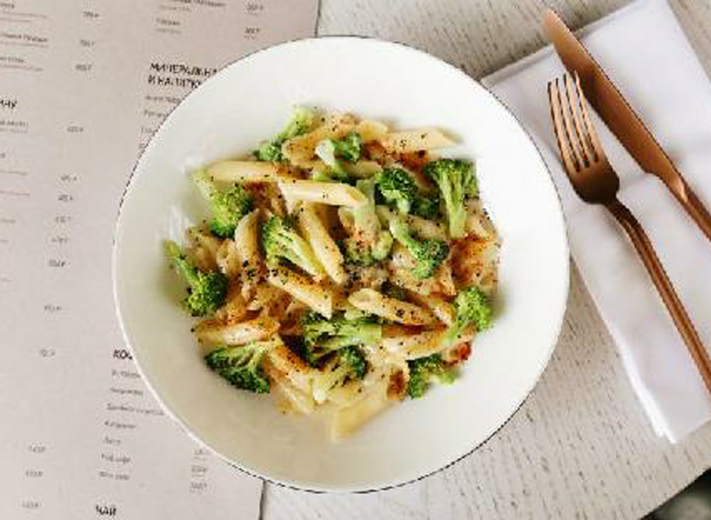 Penne pasta with broccoli and sauce raclette recipe