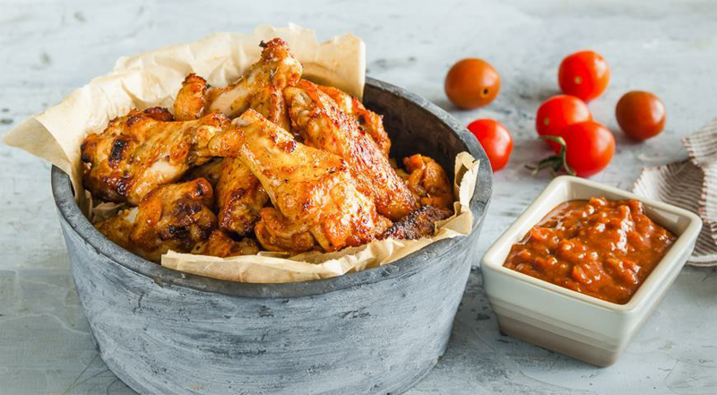 Chicken wings on the grill with homemade BBQ sauce recipe