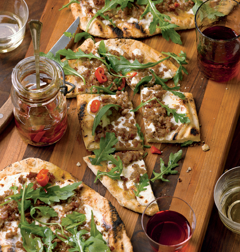 Grilled pizzetta with stracchino, sausage, arugula & chili Ool recipe