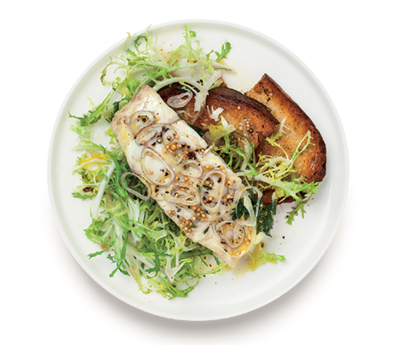 Poached bass over frisee with mustard dressing recipe