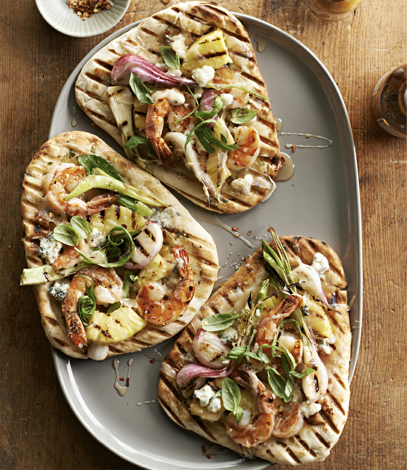 Char-grilled spring onion, pineapple, and shrimp pizzas recipe