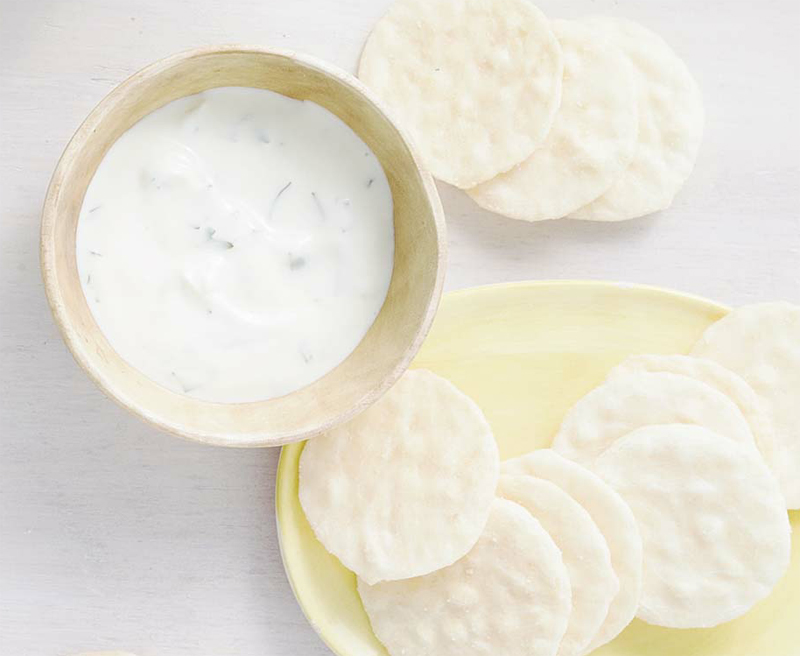 Rice crackers with coriander & garlic yoghurt recipe