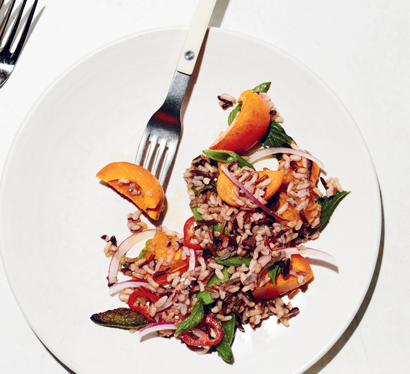 Grains with charred snap peas, apricot, and mint recipe