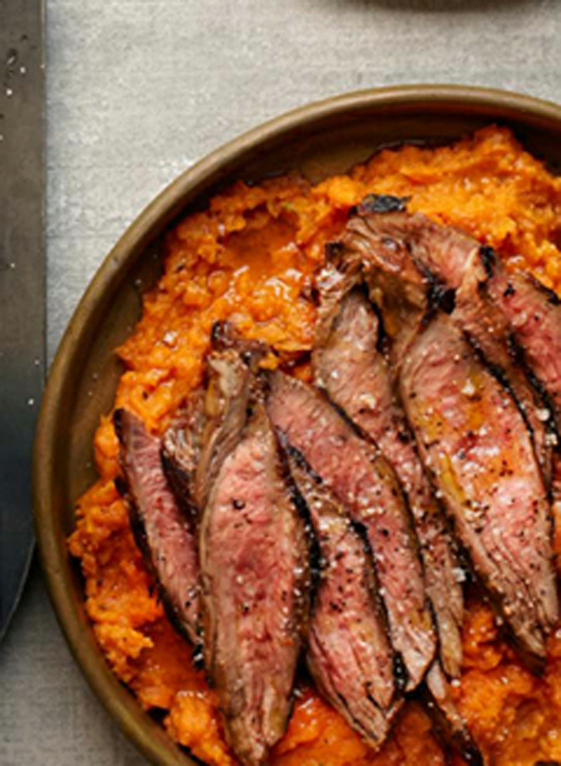 Marinated flank steak with mashed sweet potatoes recipe