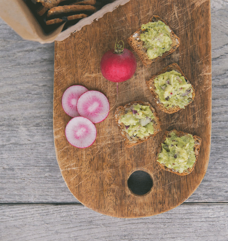 Avocado mash with red pepper flakes, red onion, and radish toasts recipe