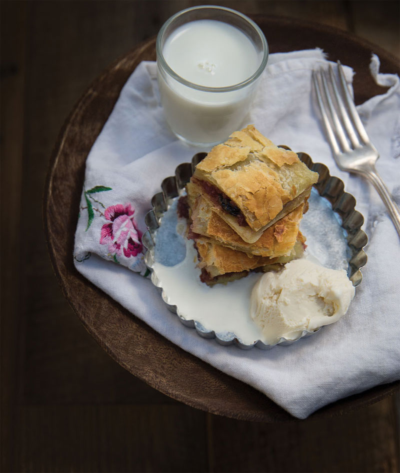 Red wine poached pear and raisin tart recipe